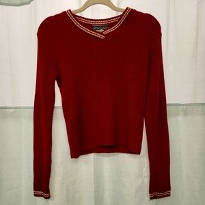 Ribbed maroon v neck sweater with white trim